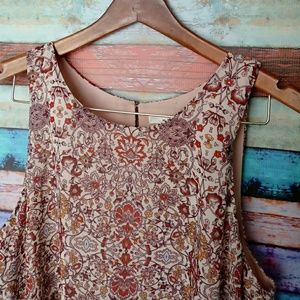 Floral and mauve sleeveless tunic